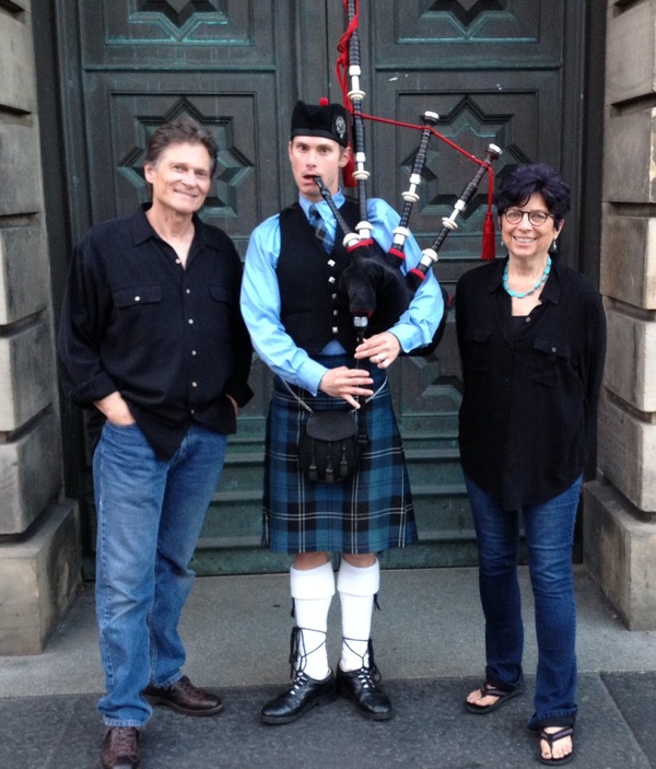 Jan and JD with bagpiper Jan and JD with bagpiper
